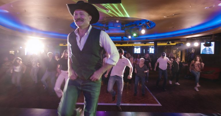 Brandon Burke teaching line dancing at a hen party in London